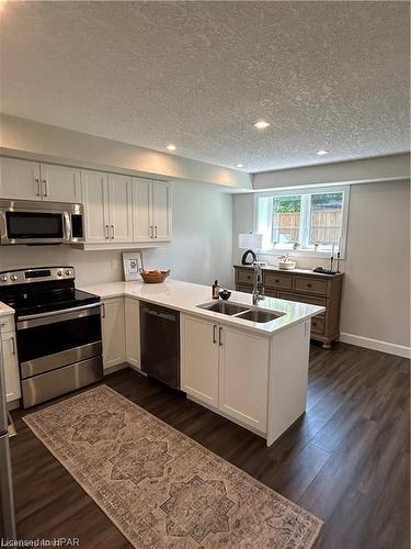 29-3202 Vivian Line, Stratford, ON - Indoor Photo Showing Kitchen With Double Sink