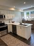 32-3202 Vivian Line, Stratford, ON  - Indoor Photo Showing Kitchen With Double Sink 