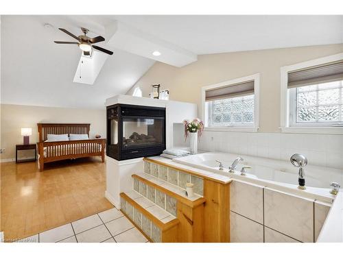 27 Classic Crescent, London, ON - Indoor Photo Showing Bathroom With Fireplace
