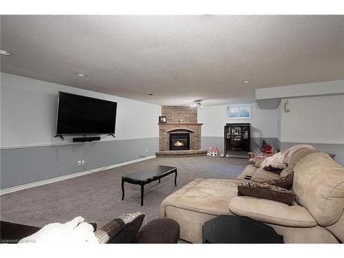 69625 Victoria Drive, Centralia, ON - Indoor Photo Showing Living Room With Fireplace