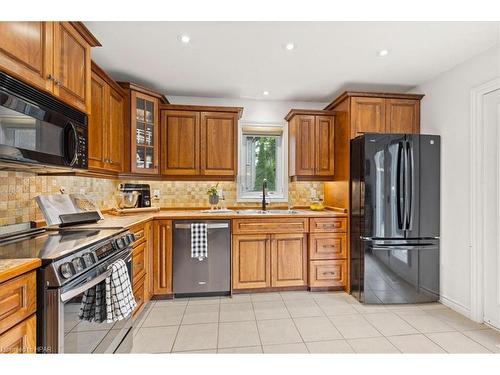 90 River Run Road, Drayton, ON - Indoor Photo Showing Kitchen With Double Sink