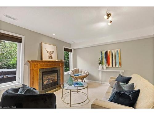 90 River Run Road, Drayton, ON - Indoor Photo Showing Living Room With Fireplace