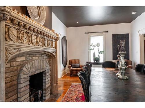 51 Shrewsbury Street, Stratford, ON - Indoor Photo Showing Dining Room With Fireplace