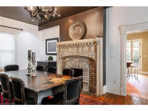 51 Shrewsbury Street, Stratford, ON - Indoor Photo Showing Dining Room With Fireplace