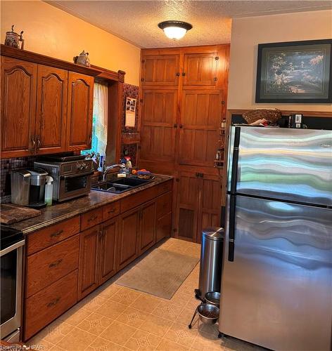 3198 Perth Rd 163, Fullarton, ON - Indoor Photo Showing Kitchen With Double Sink