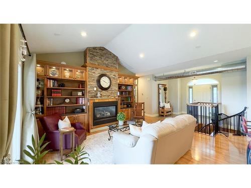 6055 Fischer Road, Mitchell, ON - Indoor Photo Showing Living Room With Fireplace