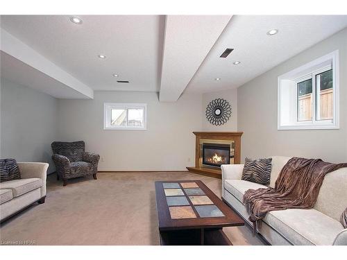 91 Norwood Court, Stratford, ON - Indoor Photo Showing Living Room With Fireplace