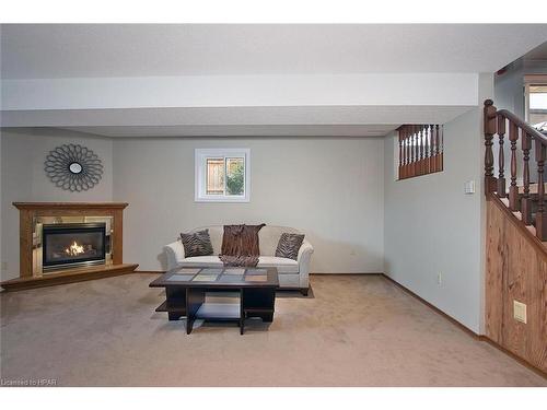 91 Norwood Court, Stratford, ON - Indoor Photo Showing Living Room With Fireplace