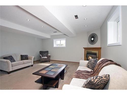 91 Norwood Court, Stratford, ON - Indoor Photo Showing Living Room With Fireplace