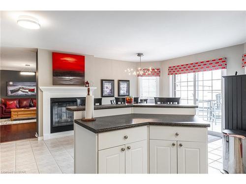 55 Stoneridge Boulevard, St. Marys, ON - Indoor Photo Showing Kitchen With Fireplace