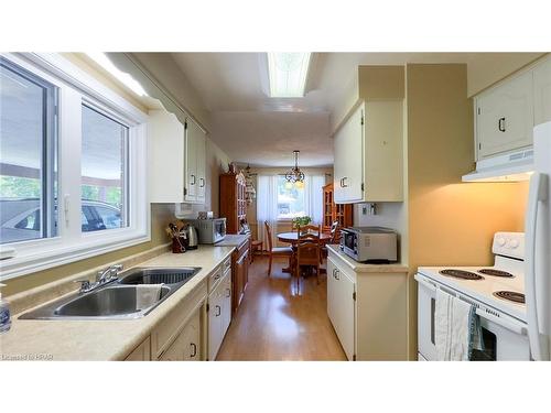 205 Spence Cr Crescent, Mitchell, ON - Indoor Photo Showing Kitchen With Double Sink