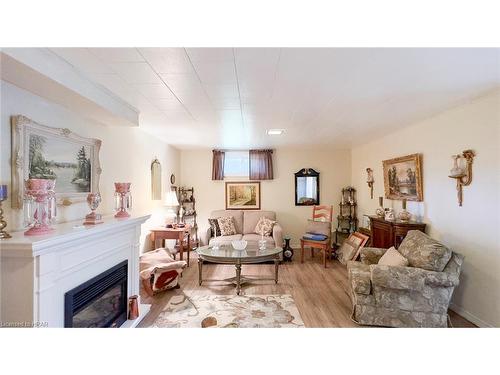 205 Spence Cr Crescent, Mitchell, ON - Indoor Photo Showing Living Room With Fireplace