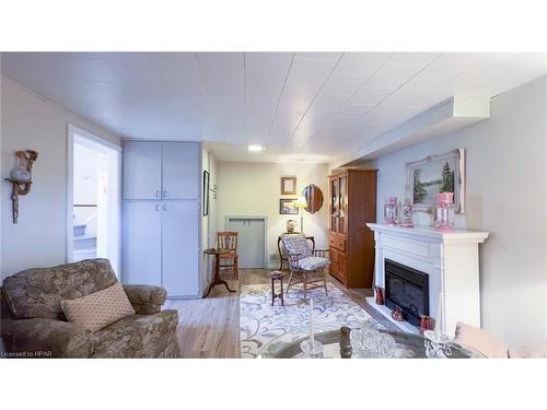 205 Spence Cr Crescent, Mitchell, ON - Indoor Photo Showing Living Room With Fireplace