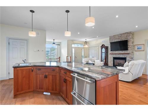 221 John Street, Harriston, ON - Indoor Photo Showing Kitchen With Fireplace