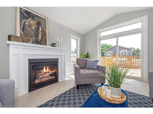 22 Blfs Vw Boulevard, Huron Haven, ON - Indoor Photo Showing Living Room With Fireplace