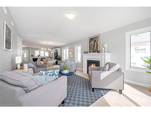 22 Blfs Vw Boulevard, Huron Haven, ON - Indoor Photo Showing Living Room With Fireplace