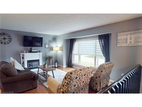 174 Charles Street, Wingham, ON - Indoor Photo Showing Living Room With Fireplace