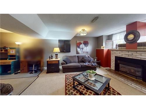 174 Charles Street, Wingham, ON - Indoor Photo Showing Living Room With Fireplace