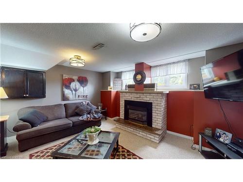 174 Charles Street, Wingham, ON - Indoor Photo Showing Living Room With Fireplace