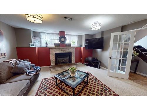 174 Charles Street, Wingham, ON - Indoor Photo Showing Living Room With Fireplace