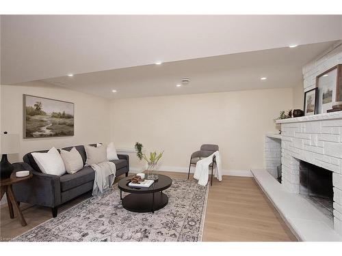 3552 Road 112, Stratford, ON - Indoor Photo Showing Living Room With Fireplace