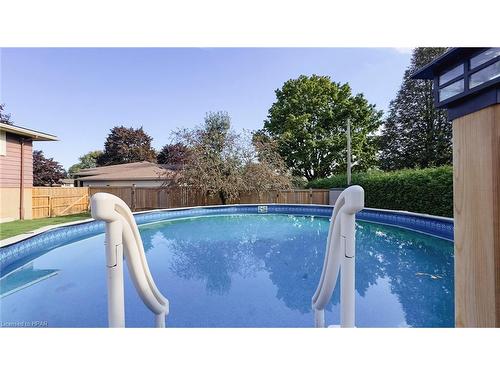 223 Coulton Drive, Mitchell, ON - Outdoor With Above Ground Pool With Backyard