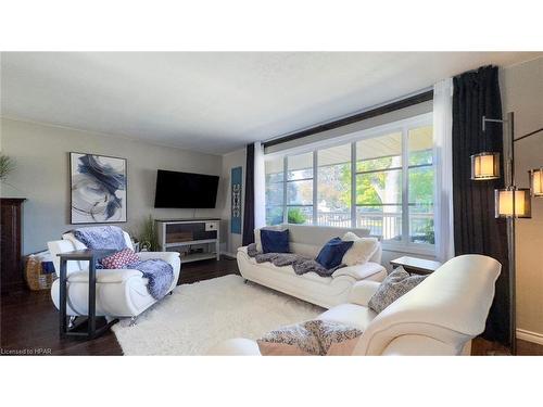 223 Coulton Drive, Mitchell, ON - Indoor Photo Showing Living Room With Fireplace