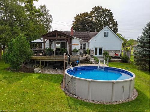 2828 Line 34, Perth East, ON - Outdoor With Above Ground Pool With Deck Patio Veranda With Backyard