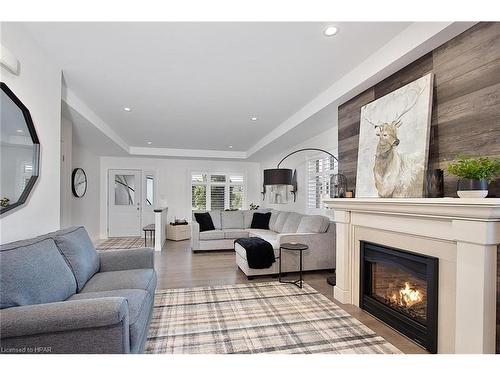 247 Sunset Drive, Mitchell, ON - Indoor Photo Showing Living Room With Fireplace