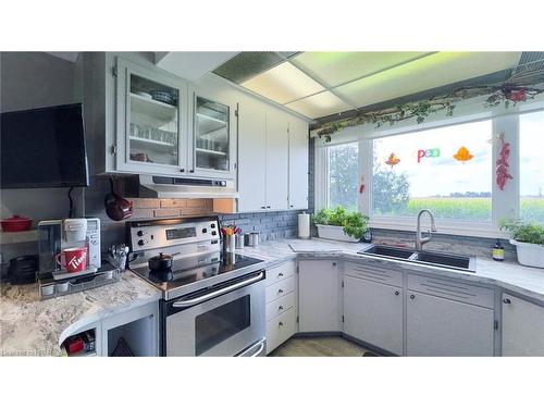 73399 London Road, Kippen, ON - Indoor Photo Showing Kitchen With Double Sink