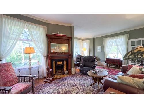 73399 London Road, Kippen, ON - Indoor Photo Showing Living Room With Fireplace