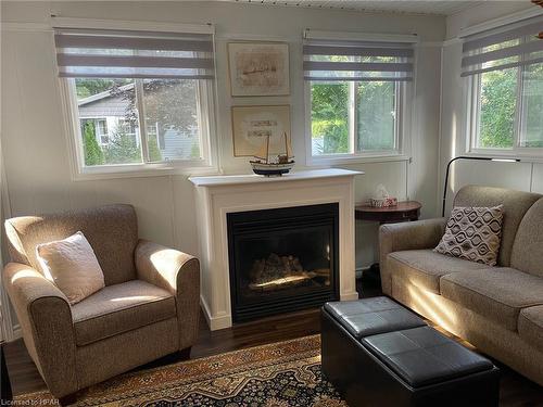 15 Huron Lane, Meneset, ON - Indoor Photo Showing Living Room With Fireplace