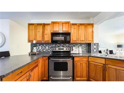 216 Shadywood Crescent, Point Clark, ON - Indoor Photo Showing Kitchen With Double Sink