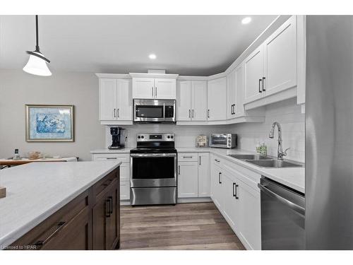 273 Mccourt Place, Atwood, ON - Indoor Photo Showing Kitchen With Double Sink