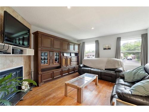 27 Hines Crescent, London, ON - Indoor Photo Showing Living Room With Fireplace