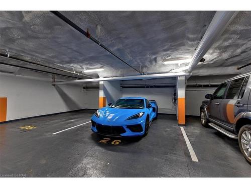 1305-71 Wyndham Street S, Guelph, ON - Indoor Photo Showing Garage