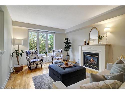 543 St Moritz Avenue, Waterloo, ON - Indoor Photo Showing Living Room With Fireplace