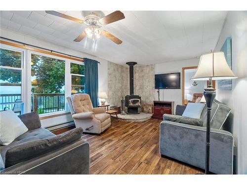 84784 Shamrock Beach Road, Ashfield-Colborne-Wawanosh, ON - Indoor Photo Showing Living Room With Fireplace