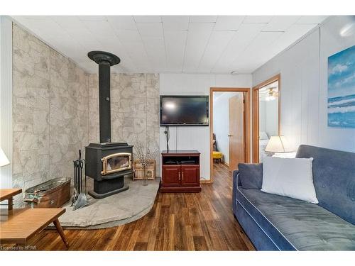 84784 Shamrock Beach Road, Ashfield-Colborne-Wawanosh, ON - Indoor Photo Showing Living Room With Fireplace