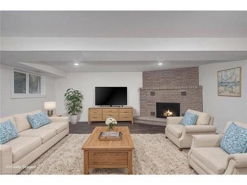 131 Briarhill Drive, Stratford, ON - Indoor Photo Showing Living Room With Fireplace