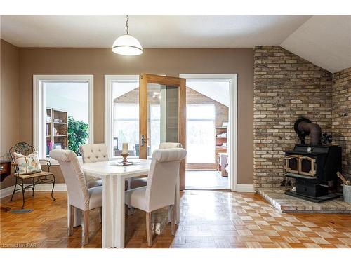 5515 Line 2, Perth South, ON - Indoor Photo Showing Dining Room With Fireplace