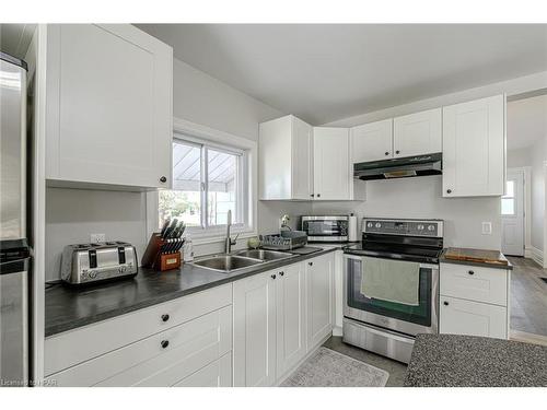 145 Victoria Avenue E, Crediton, ON - Indoor Photo Showing Kitchen With Double Sink