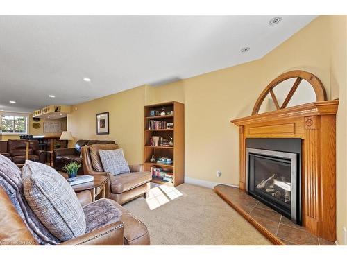 40 North Pointe Drive, Stratford, ON - Indoor Photo Showing Living Room With Fireplace