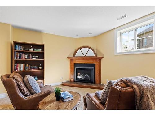 40 North Pointe Drive, Stratford, ON - Indoor Photo Showing Living Room With Fireplace