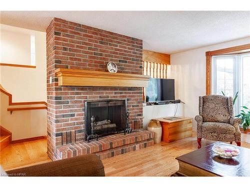 60 Meighen Mews, Stratford, ON - Indoor Photo Showing Living Room With Fireplace