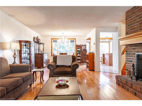 60 Meighen Mews, Stratford, ON - Indoor Photo Showing Living Room With Fireplace