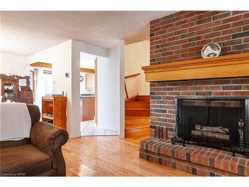 60 Meighen Mews, Stratford, ON - Indoor Photo Showing Living Room With Fireplace