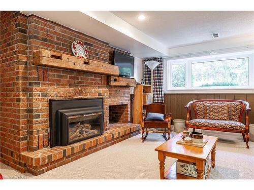 60 Meighen Mews, Stratford, ON - Indoor Photo Showing Living Room With Fireplace