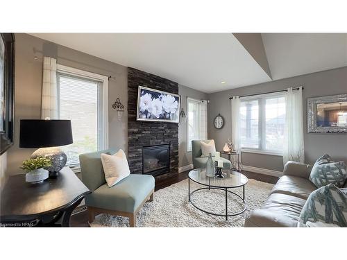 71 Clayton Street, Mitchell, ON - Indoor Photo Showing Living Room With Fireplace