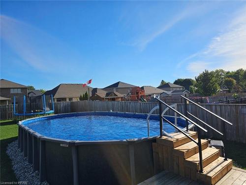 71 Clayton Street, Mitchell, ON - Outdoor With Above Ground Pool With Backyard